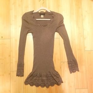 Rosamund long sleeve shirt with lace edges, so, but body con.
